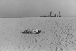 Anthony Hernandez Untitled (Long Beach, Woman on Beach with Buildings in Background), 1970